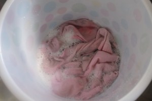 So you'd think I'd know not to wash the new red rug with the white school socks by now eh?